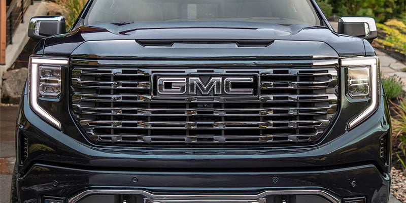 Gray GMC front fance