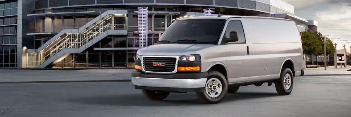 Gray GMC Savana Cargo Van Standing outside industry