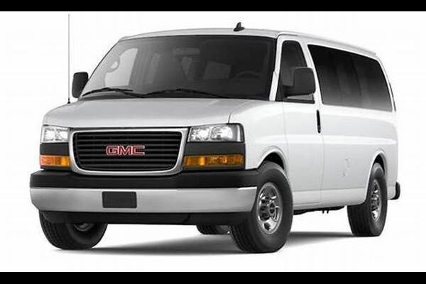 white GMC Van standing